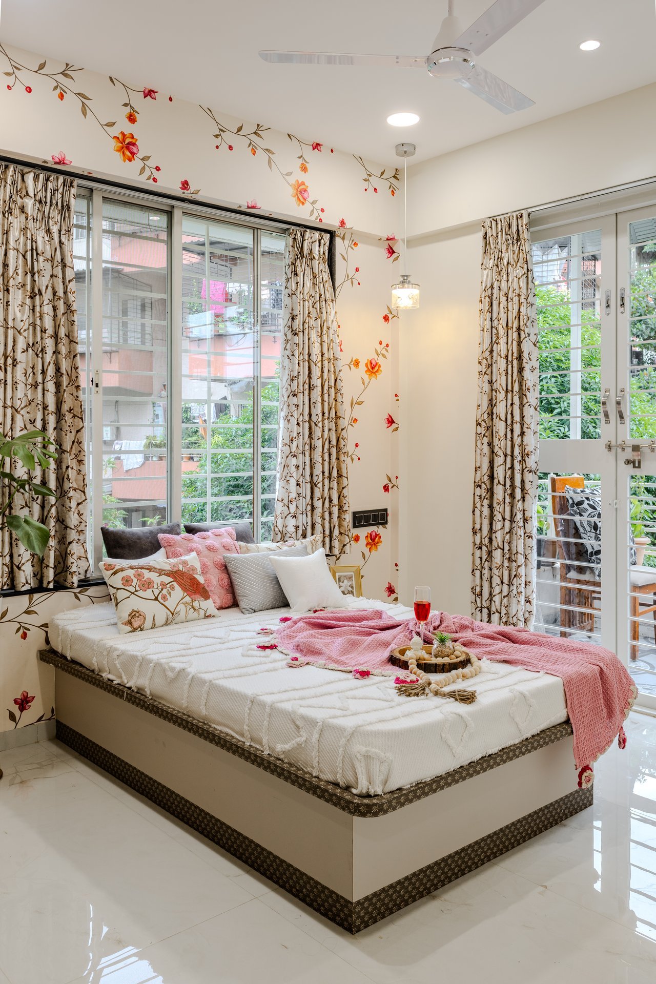 Master bedroom interior with botanical wallpaper by Design DNA