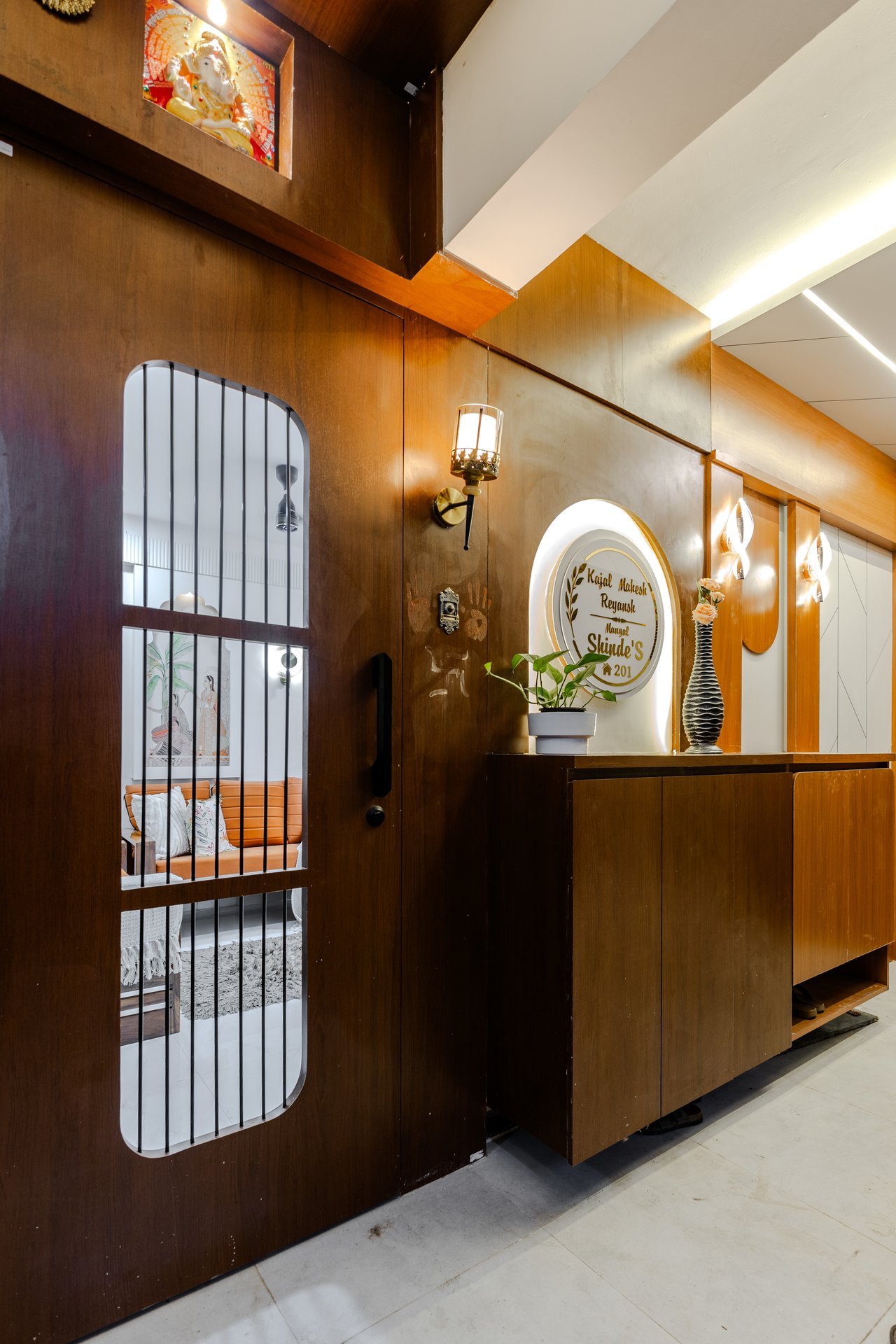Grand entrance safety door and illuminated foyer console by Design DNA