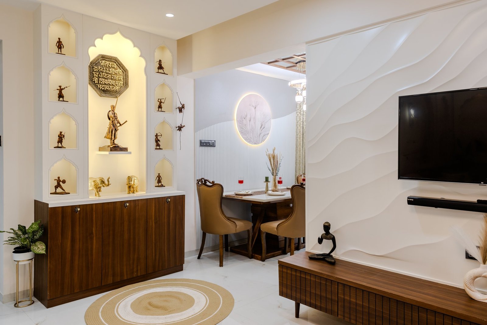 Living and dining space with custom arch niche display by Design DNA