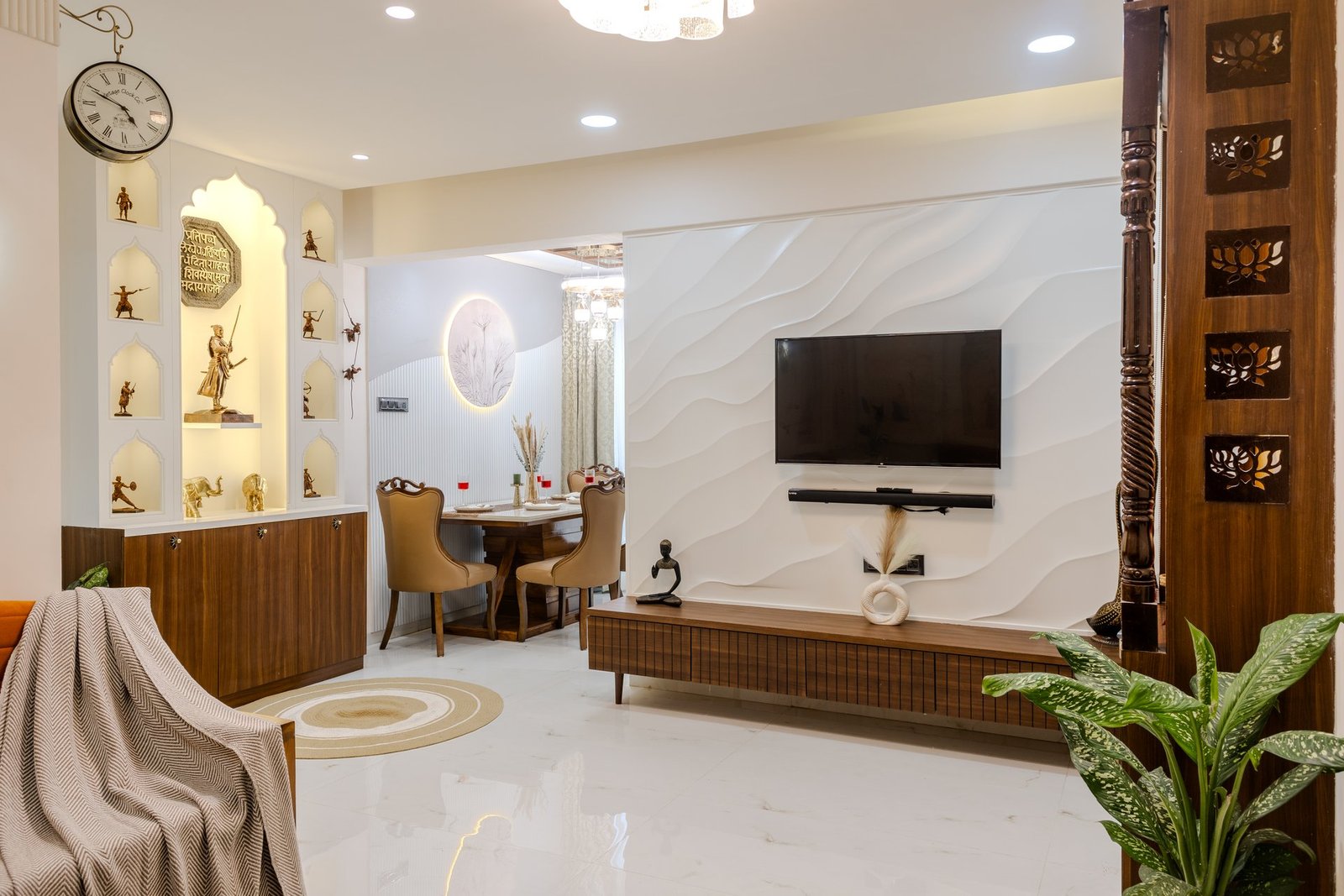 Modern living room with wave feature wall and TV console by Design DNA