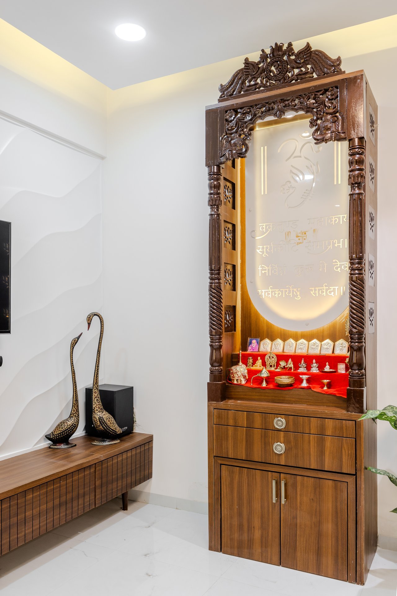 Handcrafted wooden pooja unit with backlit glass by Design DNA